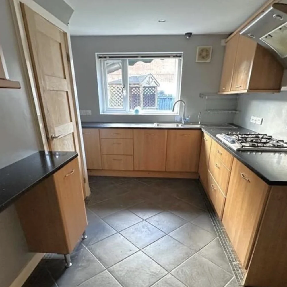 Before — tired kitchen awaiting refurbishment